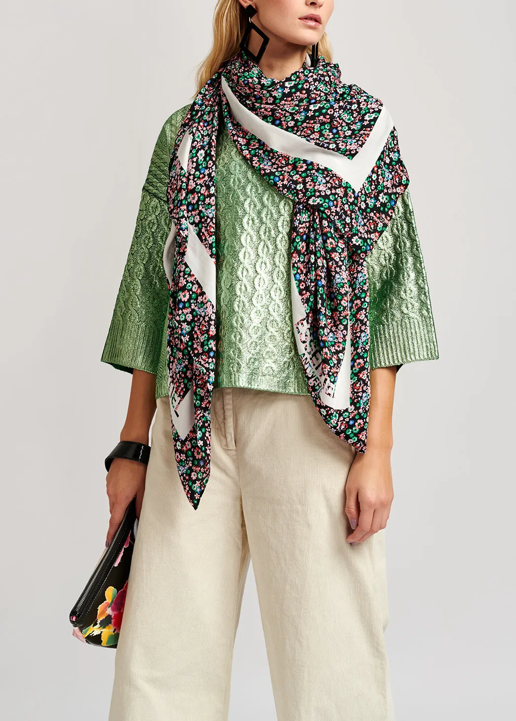 Green metallic cable-knit sweater