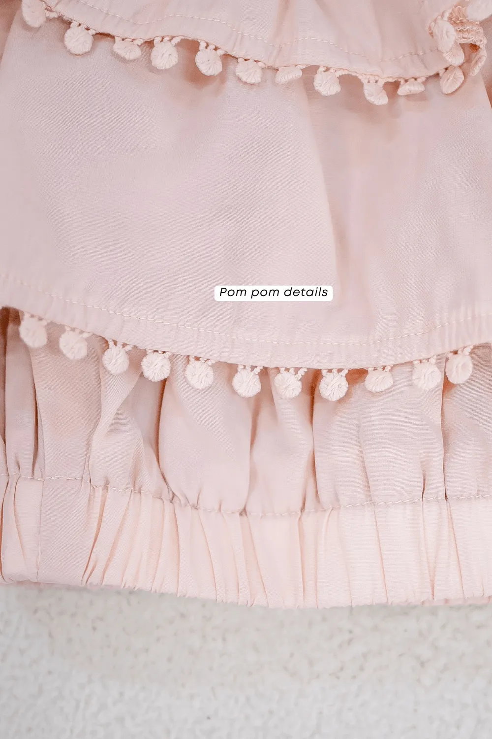 LINDSAY POM POM OFFSIE TOP IN WHITE