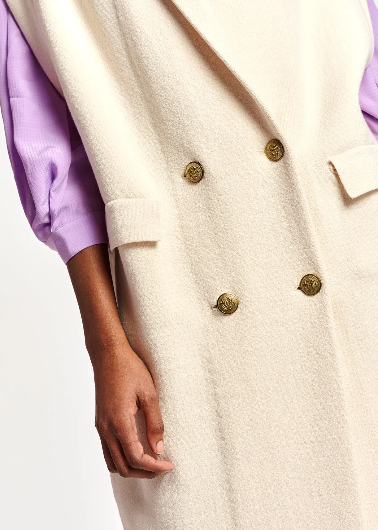 Off-white sleeveless midi-length cardigan