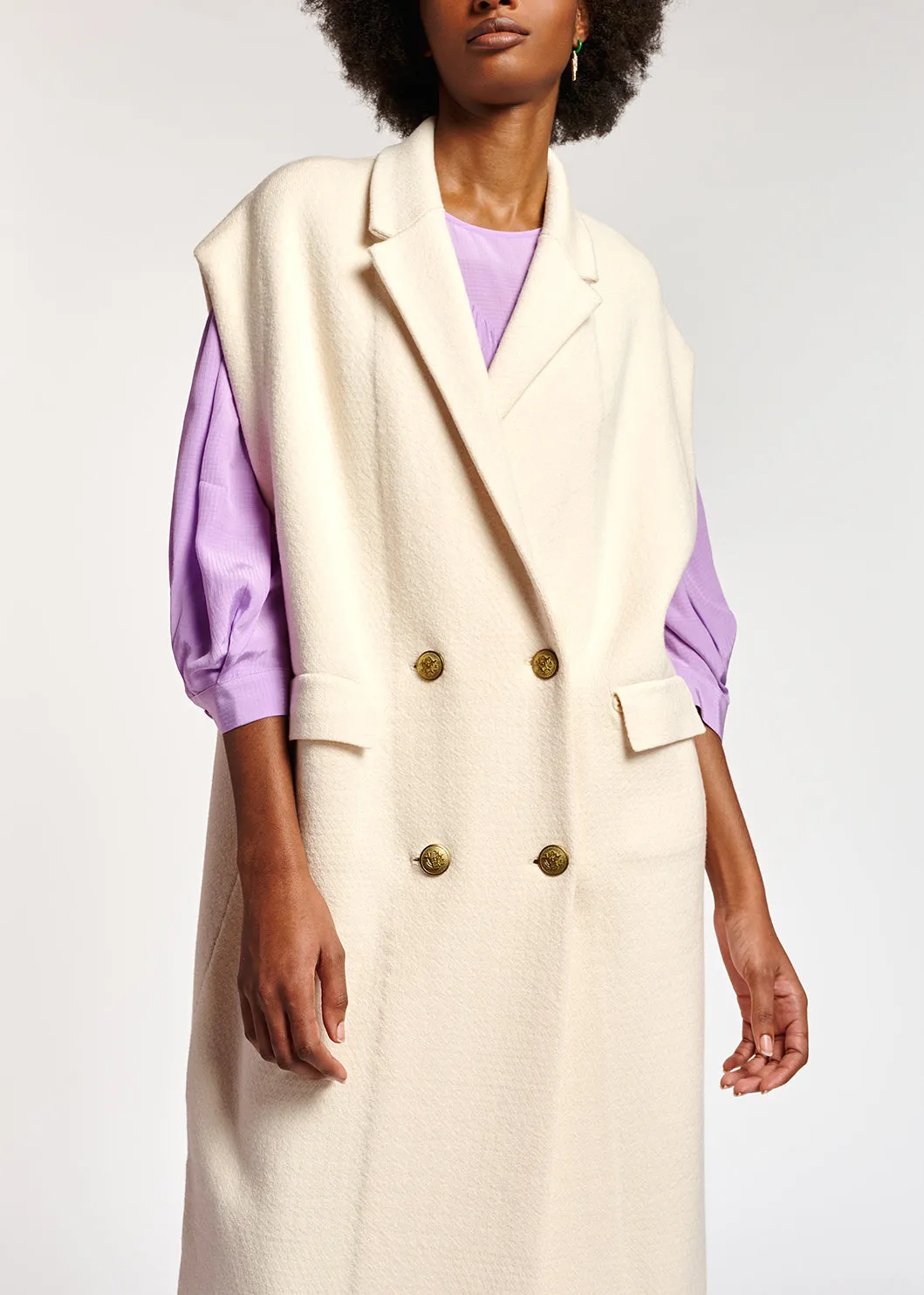 Off-white sleeveless midi-length cardigan