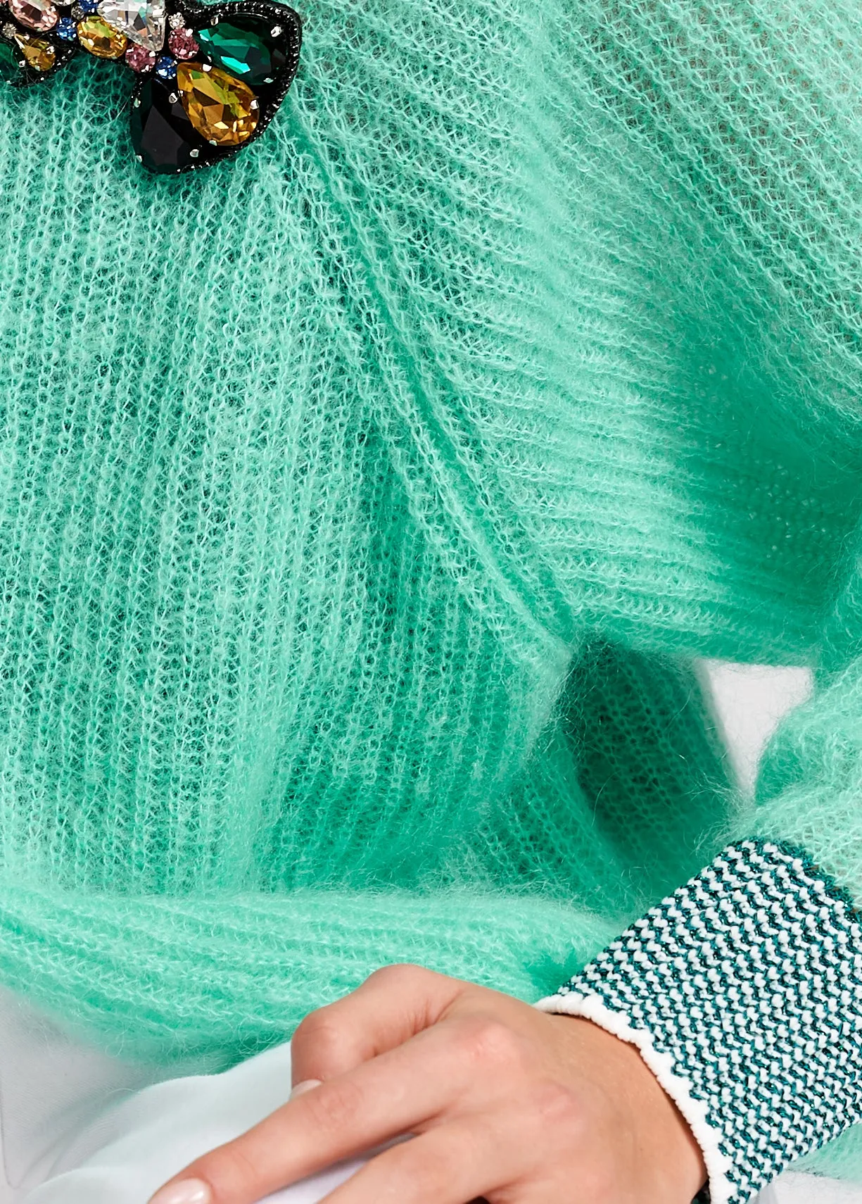 Turquoise ribbed open cardigan with accentuated trims