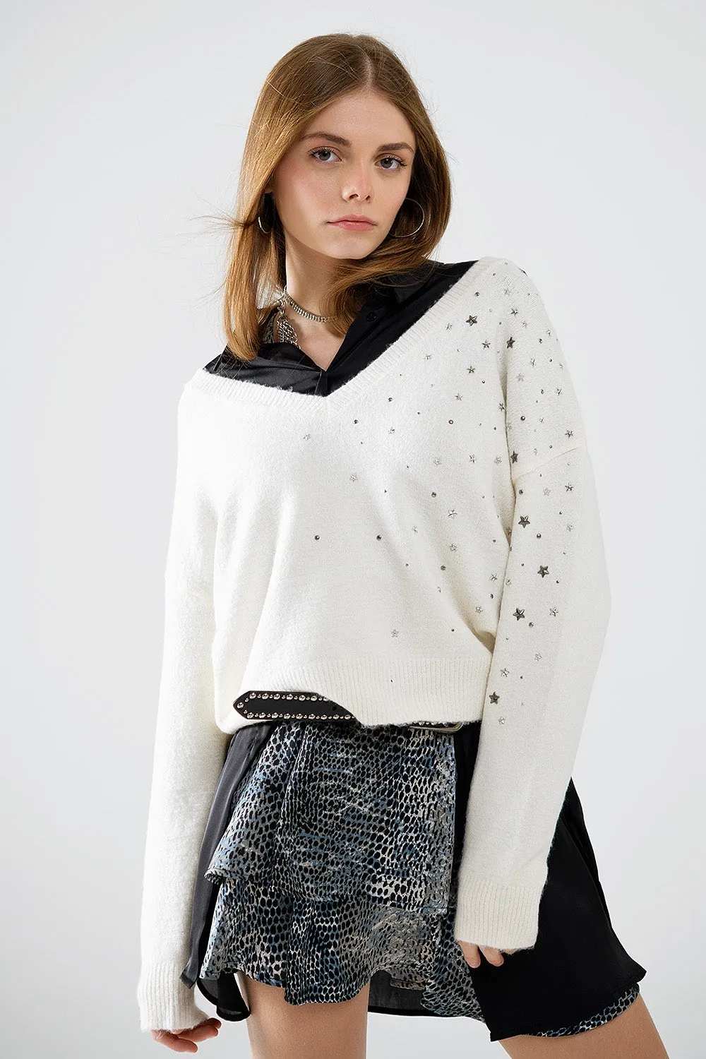 V-neck sweater embellished with metallic stars